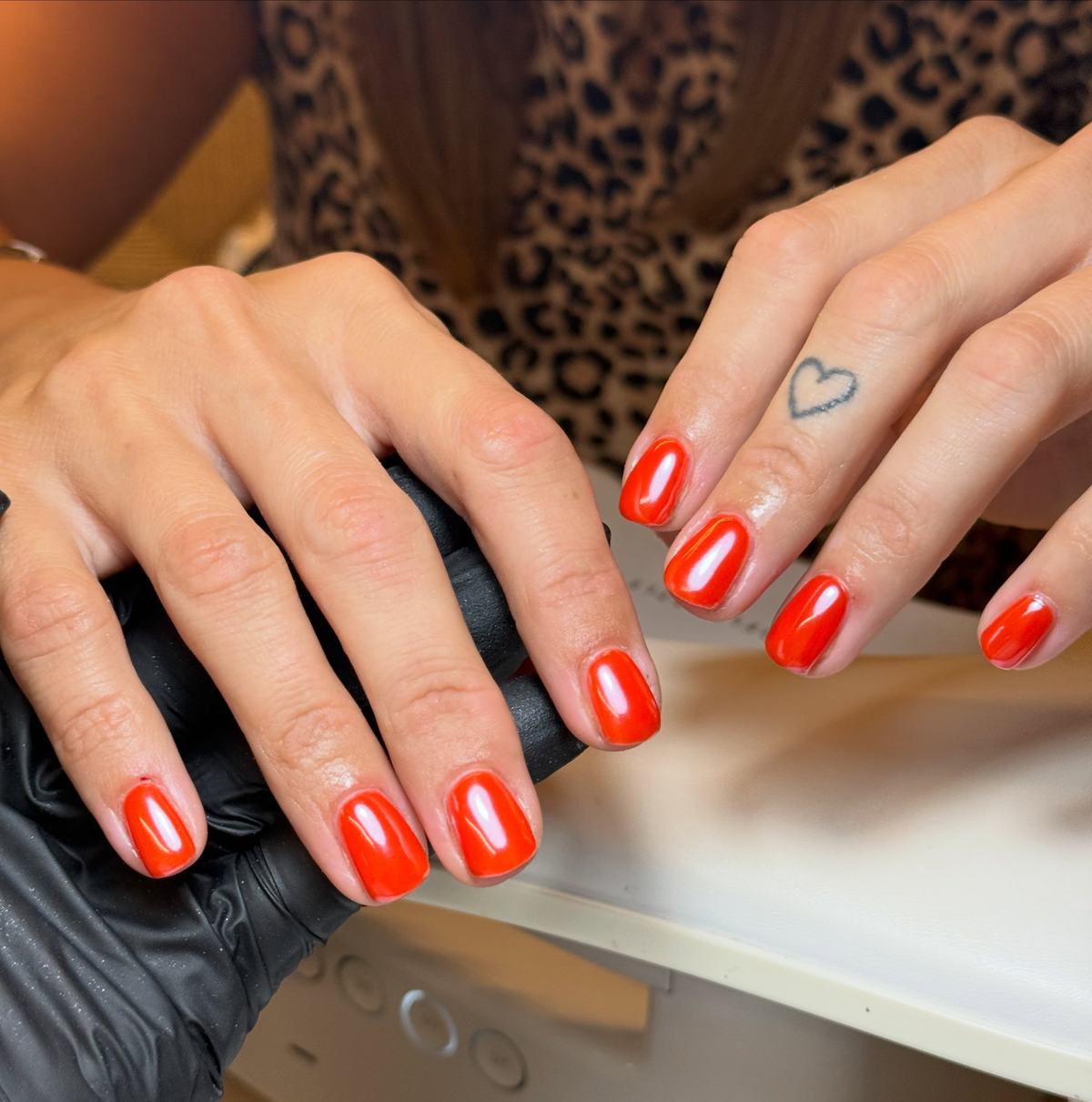 Bright orange-red short square gel nails